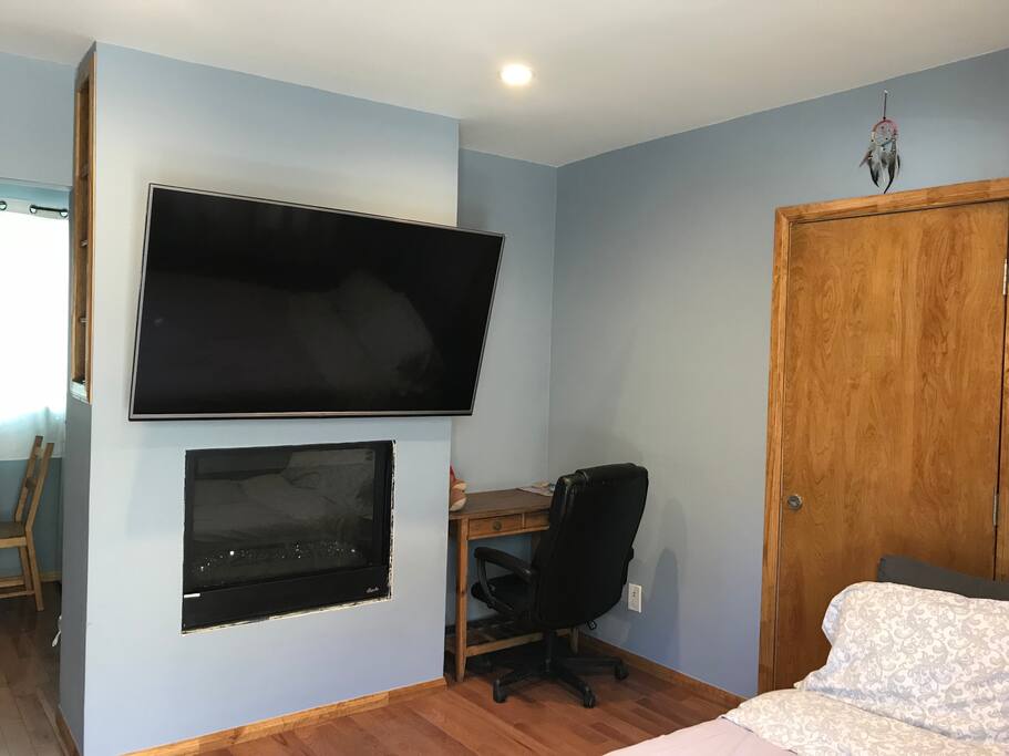60 inch plasma with cable & Laptop area with comfortable office chair with WiFi internet included