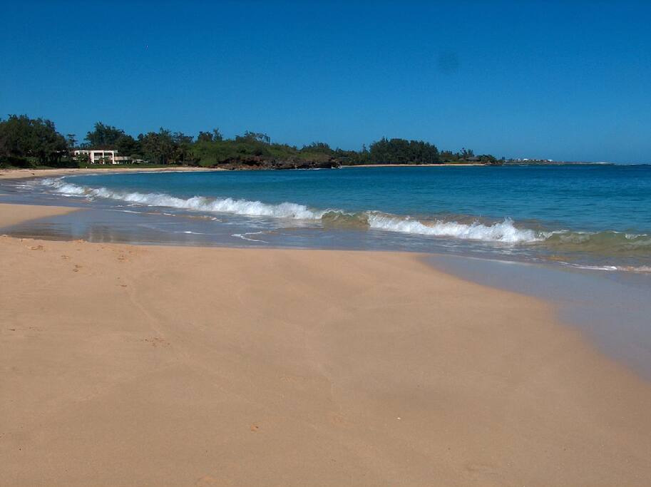 Take a walk on our secluded white sand beach...