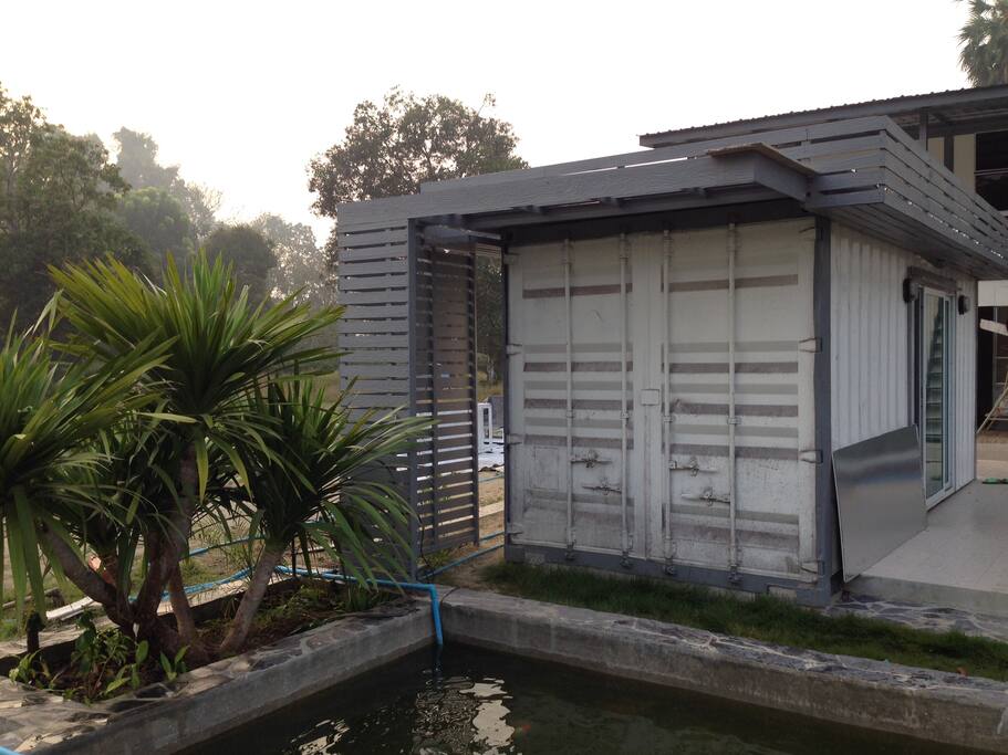 Container home by a lake