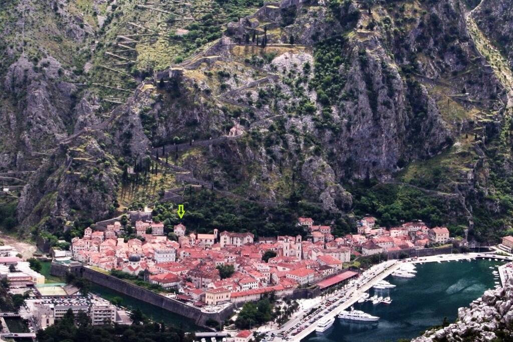 Quiet apartment nestled at rear of Kotor old town overlooking rooftops-arrow shows apartment building