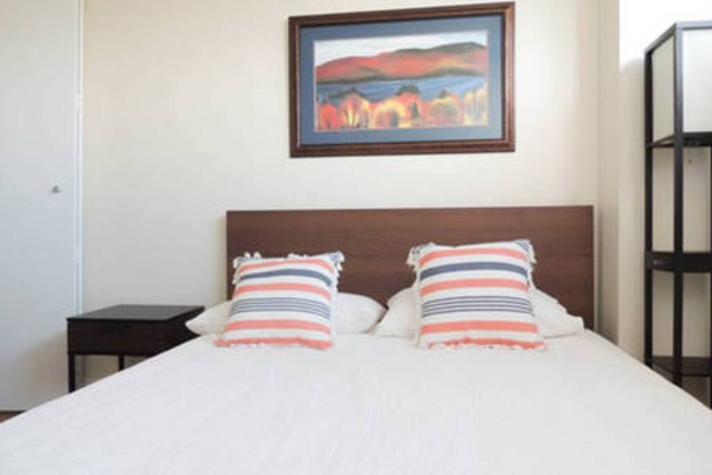 Comfortable queen size bed in the studio