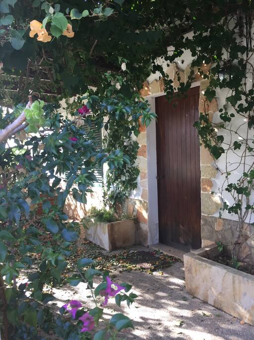 Old rustic house has Spanish charm.