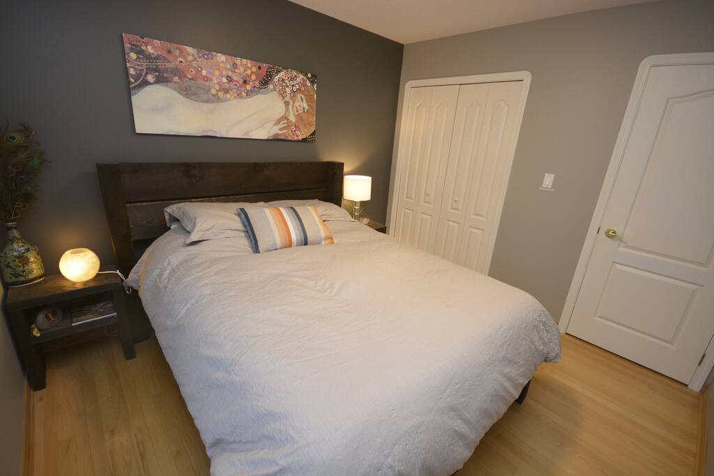 Very cozy bedroom with lots of light