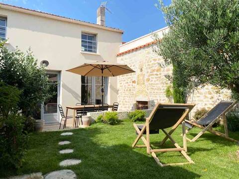 Beautifully renovated house with green garden