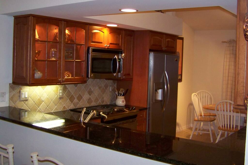 Seating at Bar area and Kitchen Table