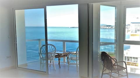 By the beach, 10th floor, 70 sqm, balcony.