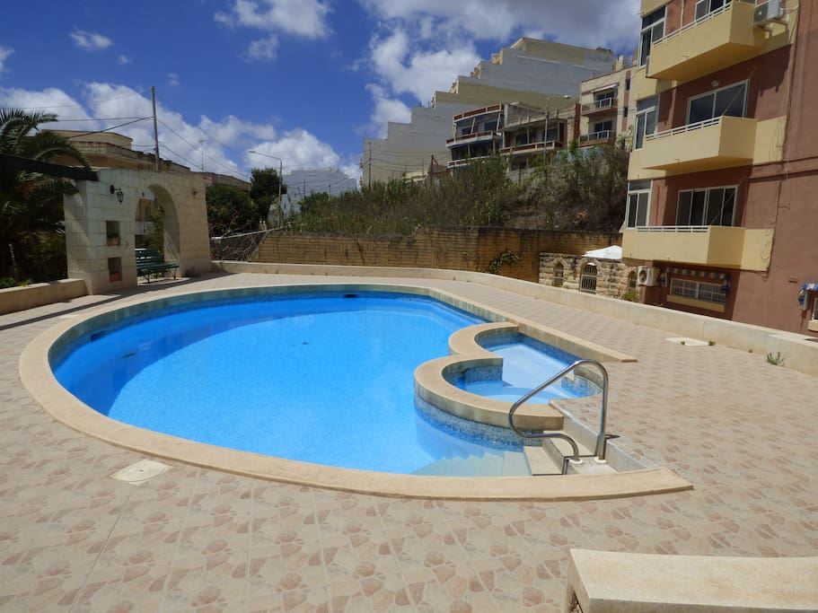 The swimming pool with splash area for younger members of the family. Wi fi also available by the pool.