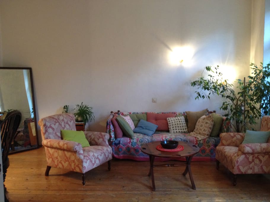 living room, sleeping sofa and two comfy chairs