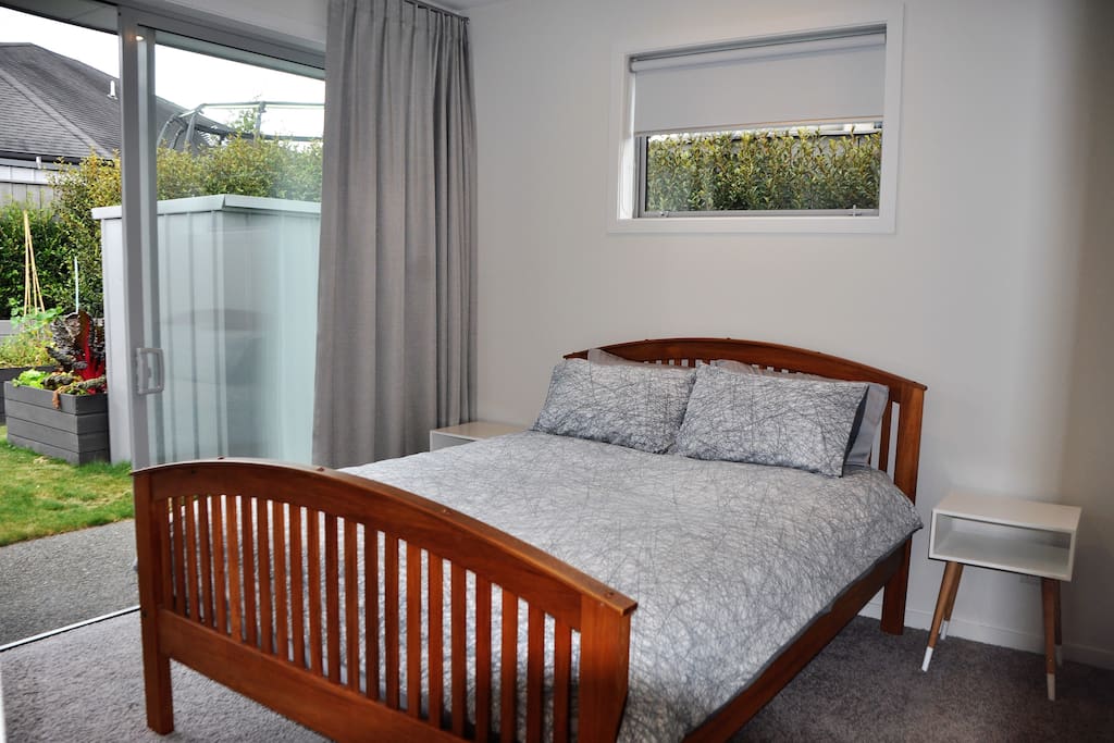 A separate master bedroom with a comfortable queen bed and 100% cotton linens.