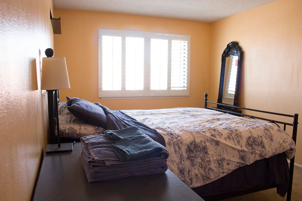 The mirror in the bedroom.