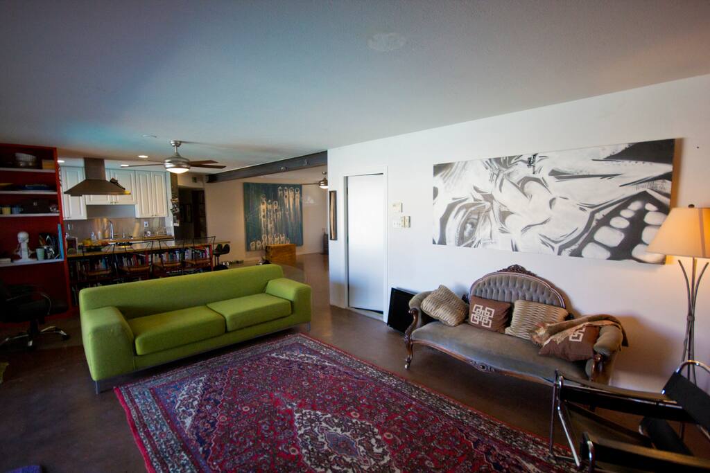 Living room has plenty of space to do yoga