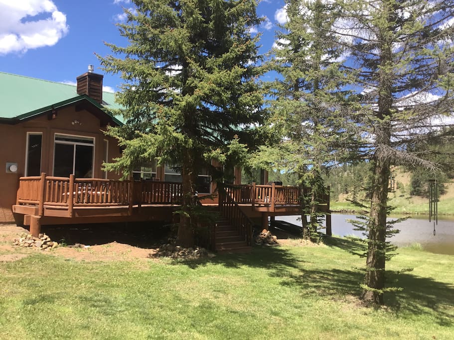 Side of home has decks all around with beautiful views