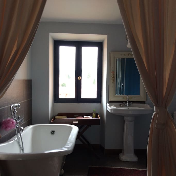 Bathroom with roll top bath