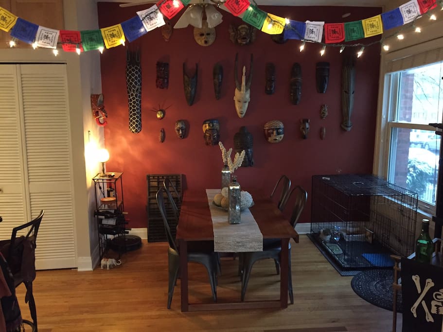 Dining room with eclectic decor. As you can see, we collect masks.
