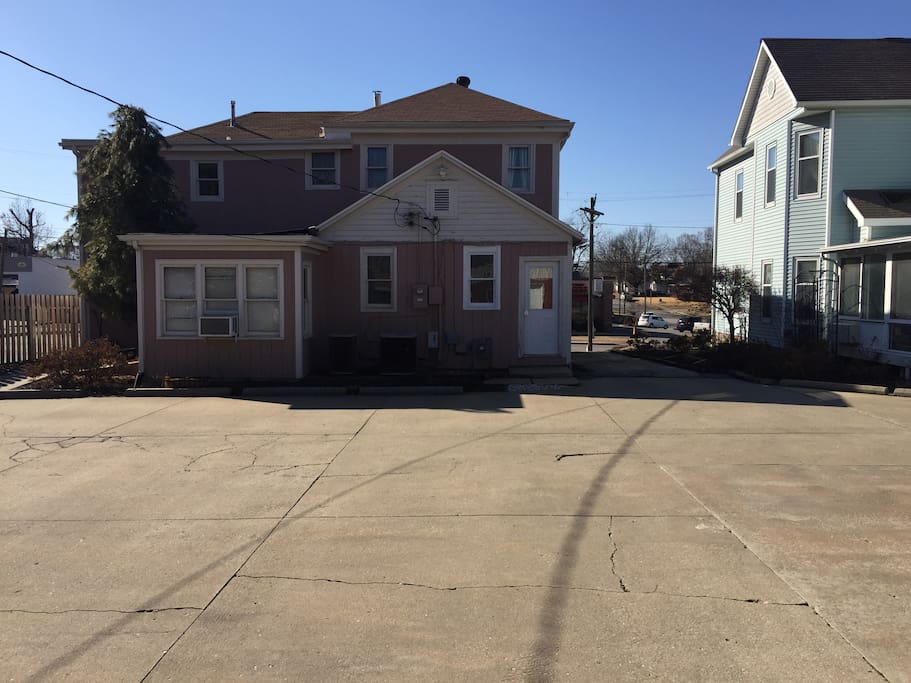 Your spacious, private parking lot located in the back of the house