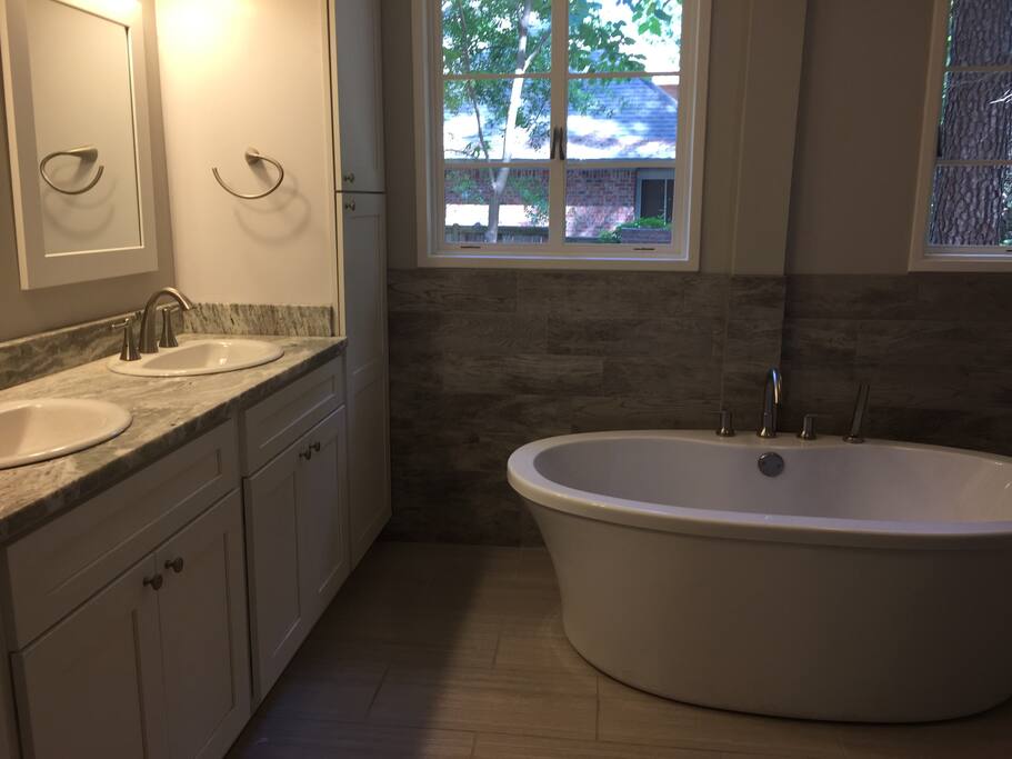Large soaking tub in guest bath