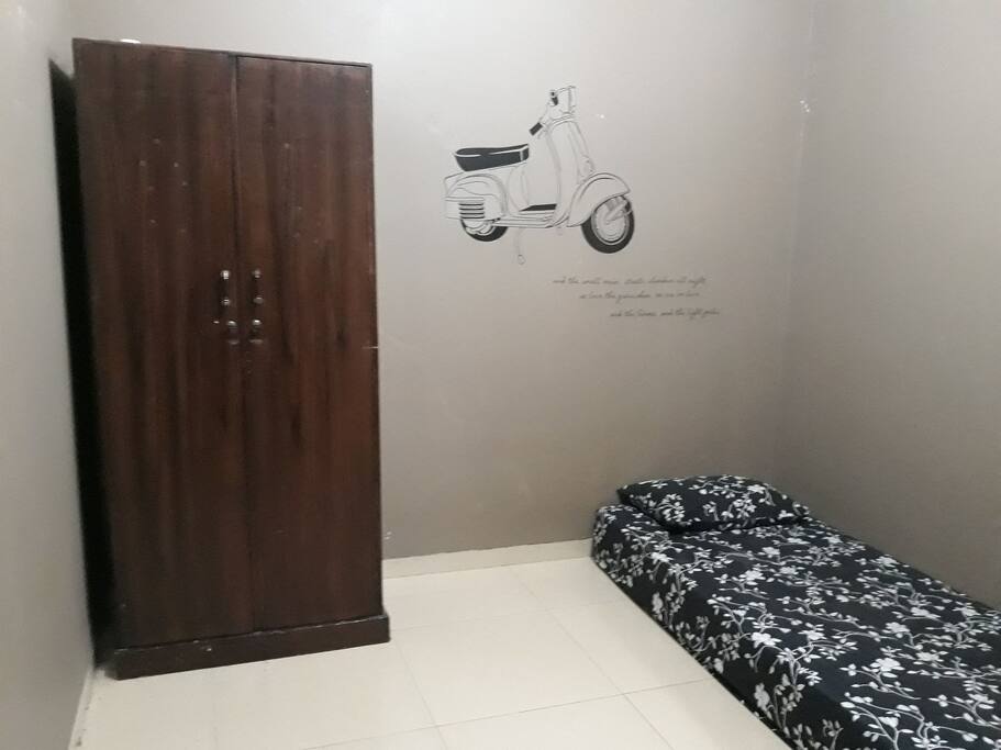 Bedroom content Single Bed and Wardrobe