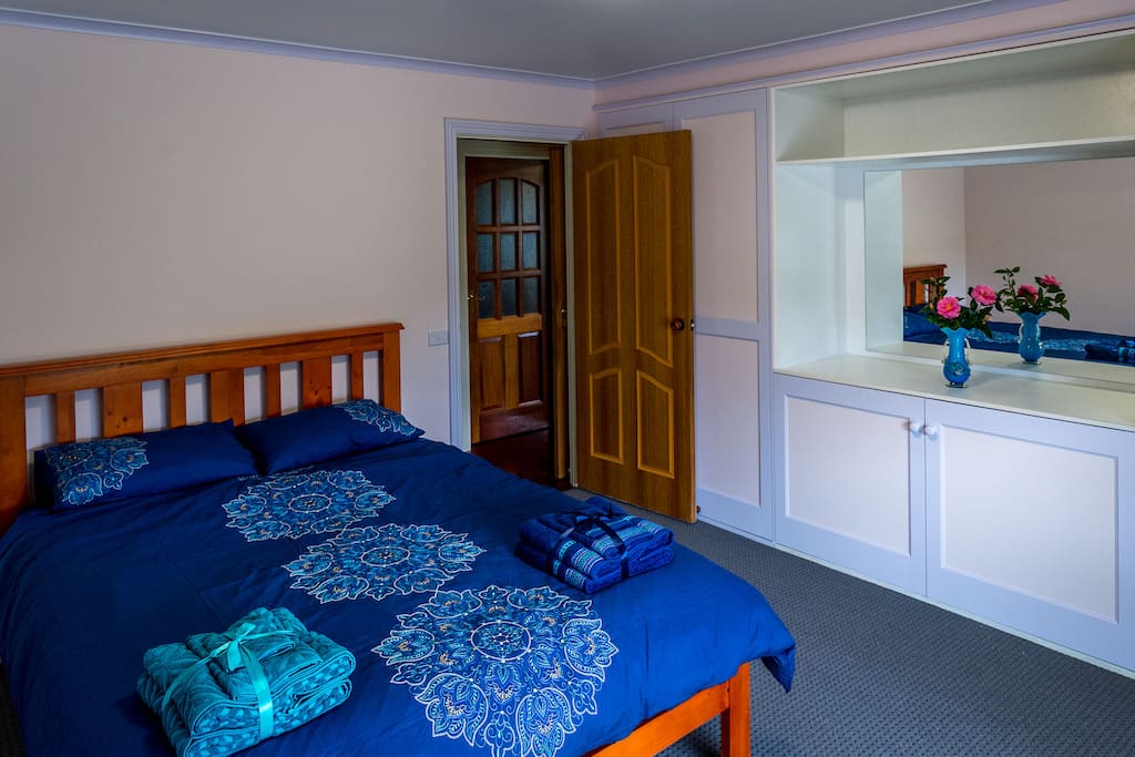 Bedroom 1 with BIR and armchair. Desk can be added on request