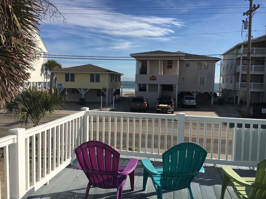 Enjoy the summer breeze sitting on this ocean view deck! Only steps to the beach!