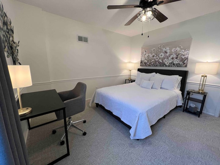 Bedroom #1: Queen bed with desk area. 