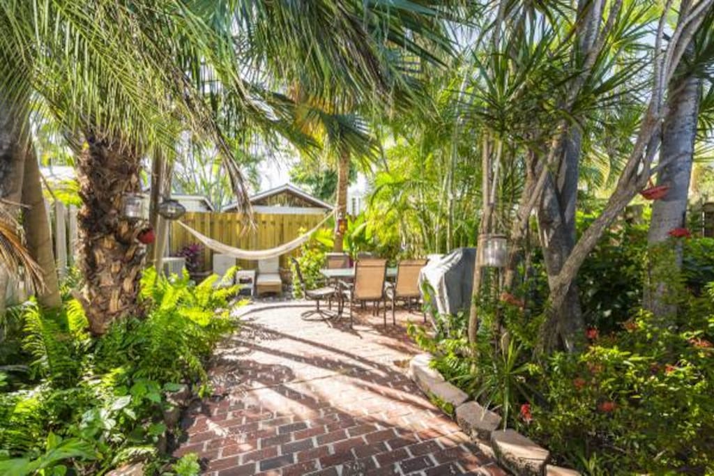 Large private garden with furniture, hammock and gas grill