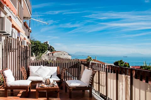 Walk to a Sandy Beach from a Scenic Hillside Getaway