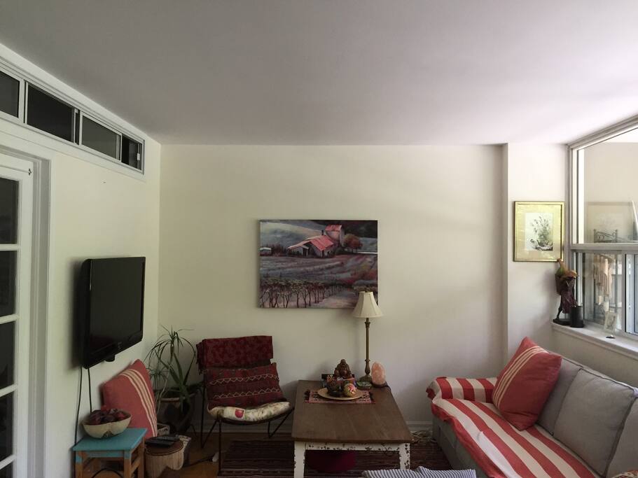 Cozy living space with couch (sleeps 1 if needed) and television (Apple TV with Netflix available)