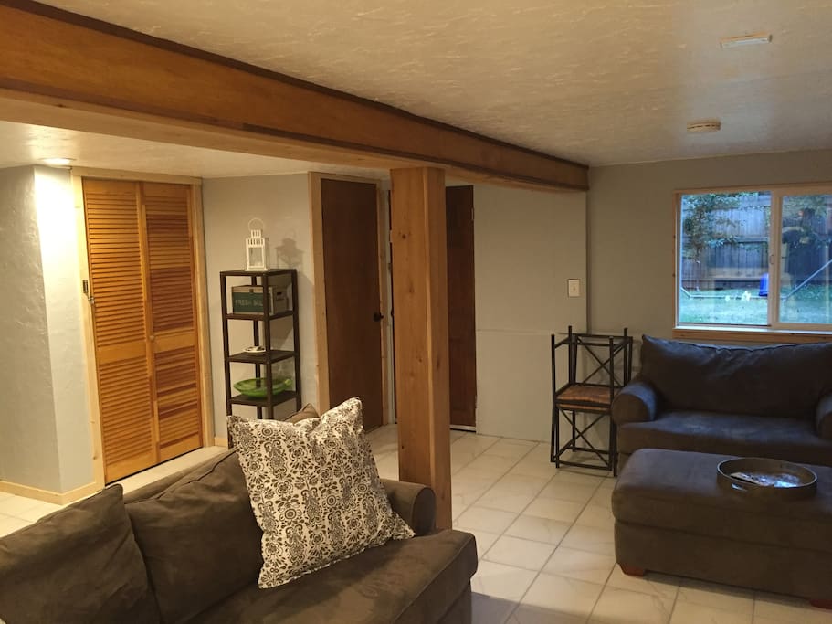 Day light basement with wood finishing and tile floors