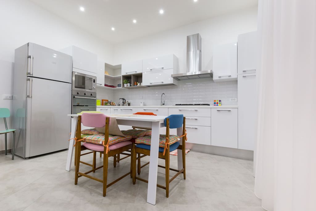 The kitchen is fully furnished