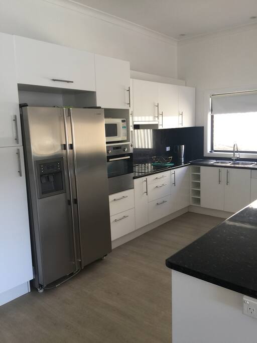 Fully equipped kitchen. Induction stove.