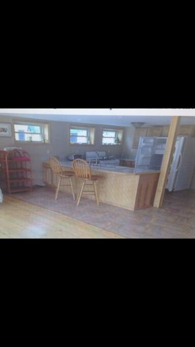 Main downstairs kitchen facing panoramic view of 1.5 mile long lake