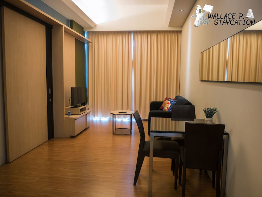Dining table beside living hall