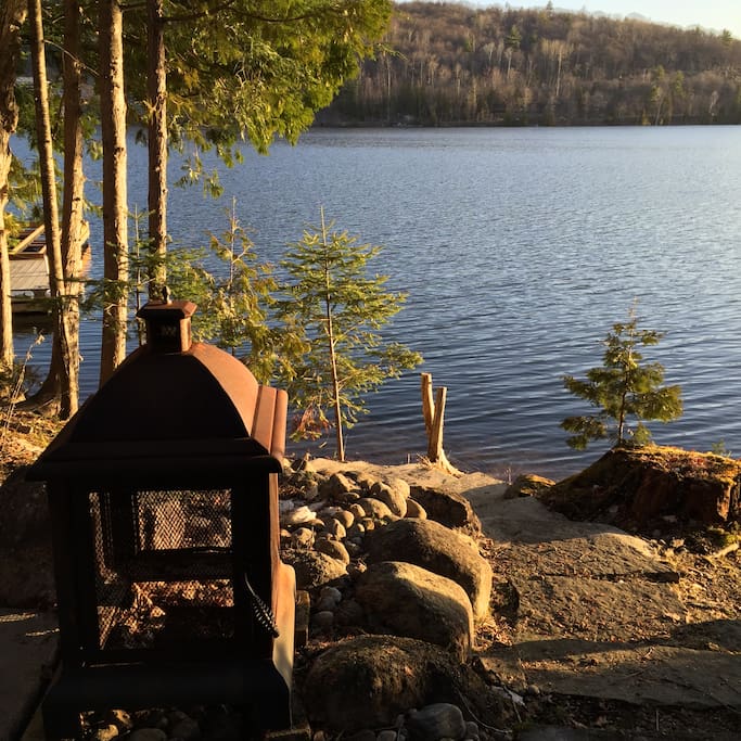 Firepit on the deck steps from beautiful McGregor lake