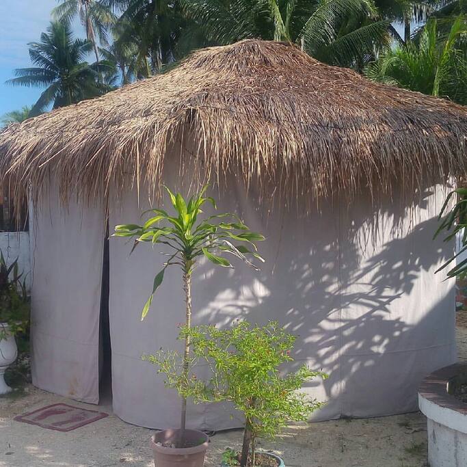 tent outside perfect for back packers and cogon roof for a nice climate inside including electric fan and free wifi