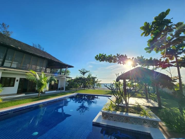 Scenic Beachfront Villa with Own Pool Houses for Rent in Botolan