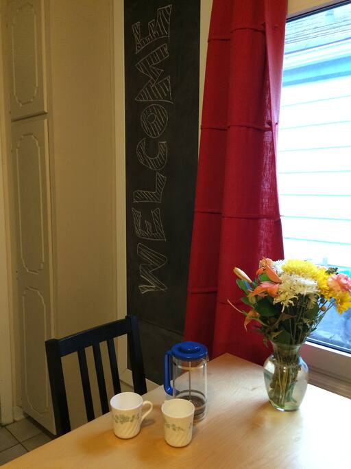 Enjoy the morning sun with a cup of coffee or tea, on us. Feel free to make notes, doodles, or plan your adventures on the chalkboard.