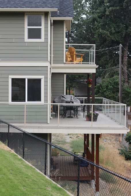 View from backyard of main deck & master bedroom patio