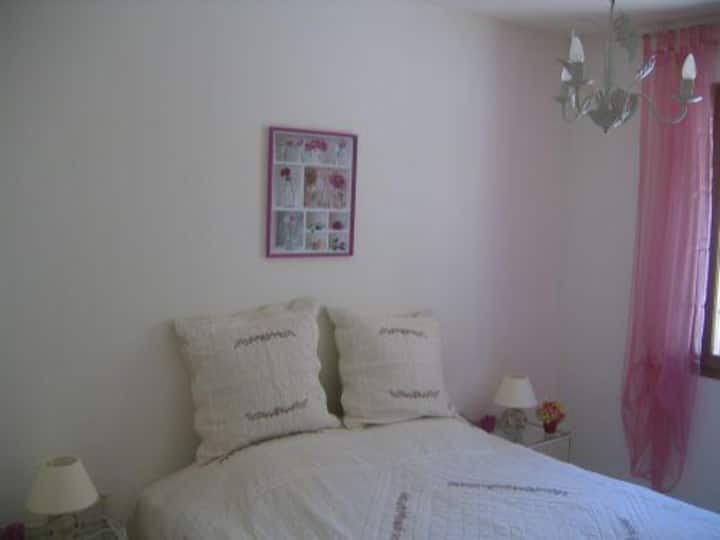 The pink room. The room faces the house's boules court.