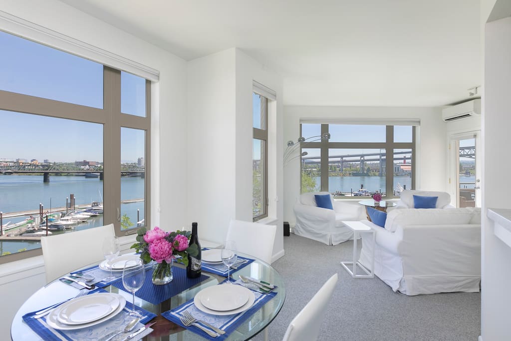 Every room in this top floor unit has an unobstructed view of the river