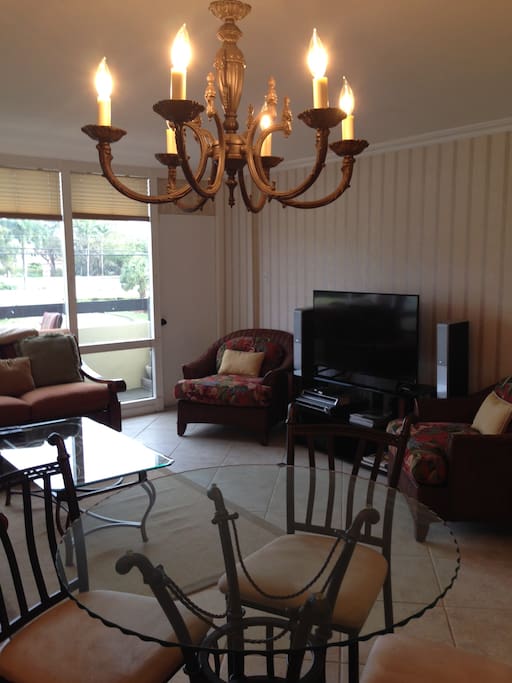 Living room with 48" flat screen tv with cable.