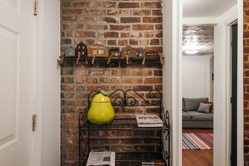 A peek at some original Civil War era brick in the foyer area. You can see the sitting area in the full-length mirror.