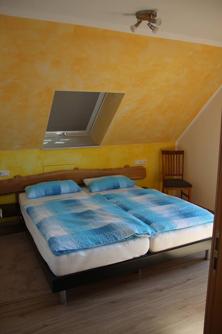 Chambre avec accès balcon
