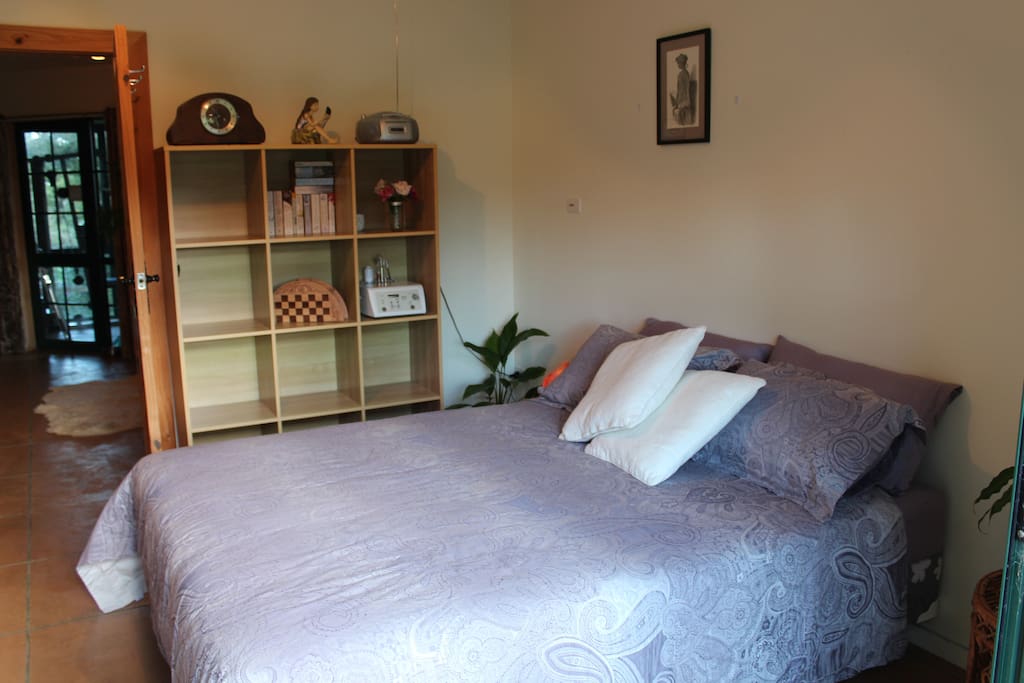 Light and airy room with direct access to the garden and orchard.