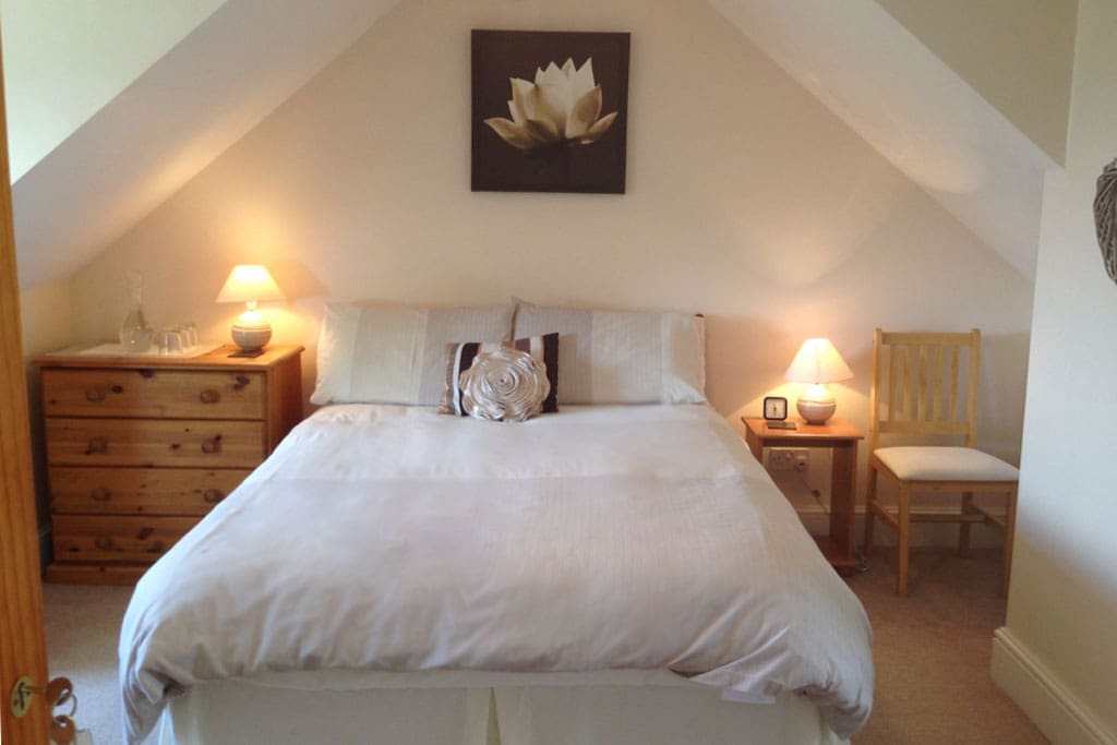 The room upstairs sleeps 3, with a double bed, a single bed, and en-suite shower room. There is also a downstairs room with private shower room.
