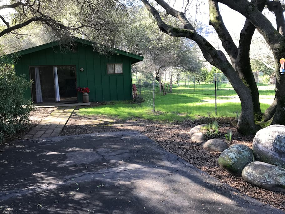Shaded driveway for parking.