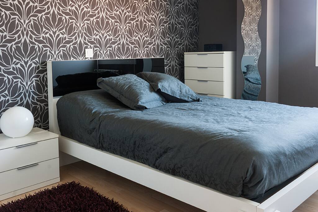 Dormitorio cama de doble.