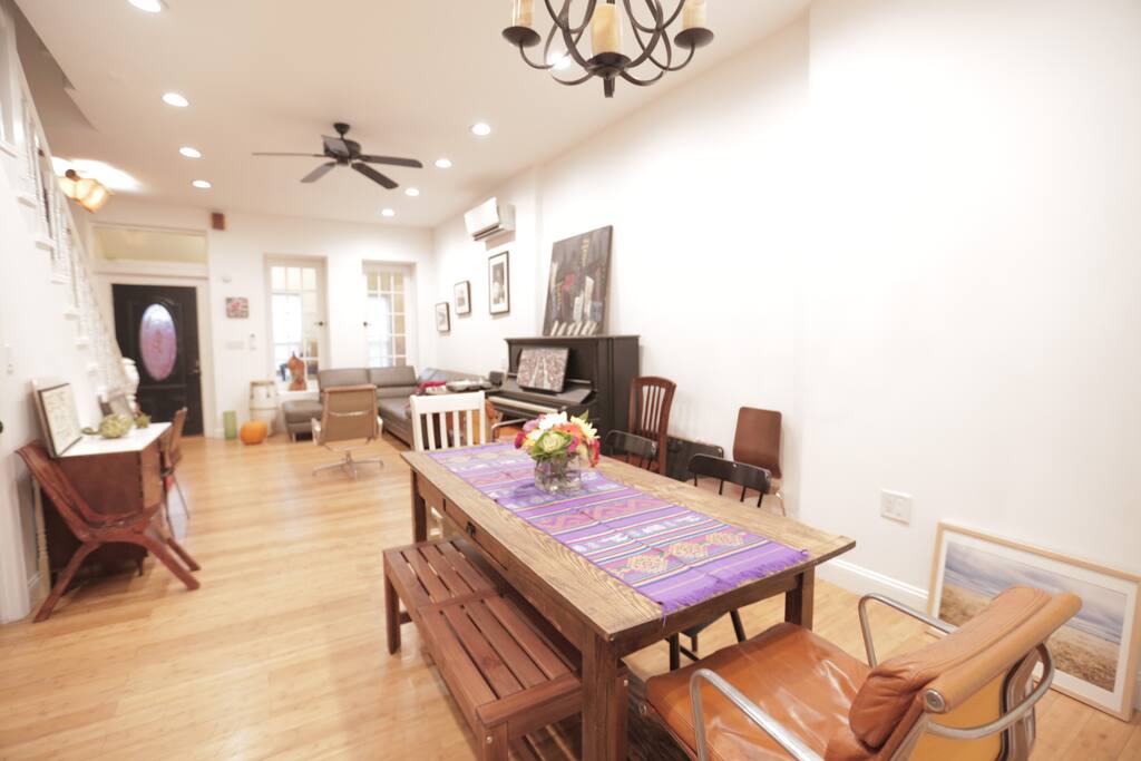 Enormous open plan living/dining room with high ceilings