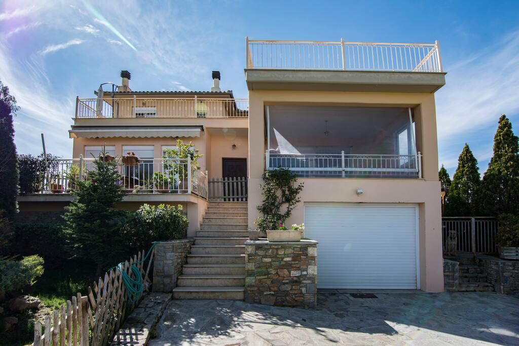 THE MAIN ENTRANCE & GARAGE