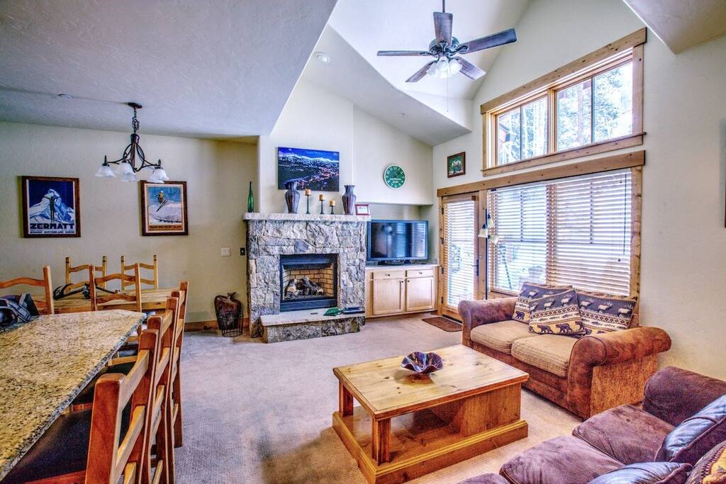 Relax in the cozy living area, complete with fireplace