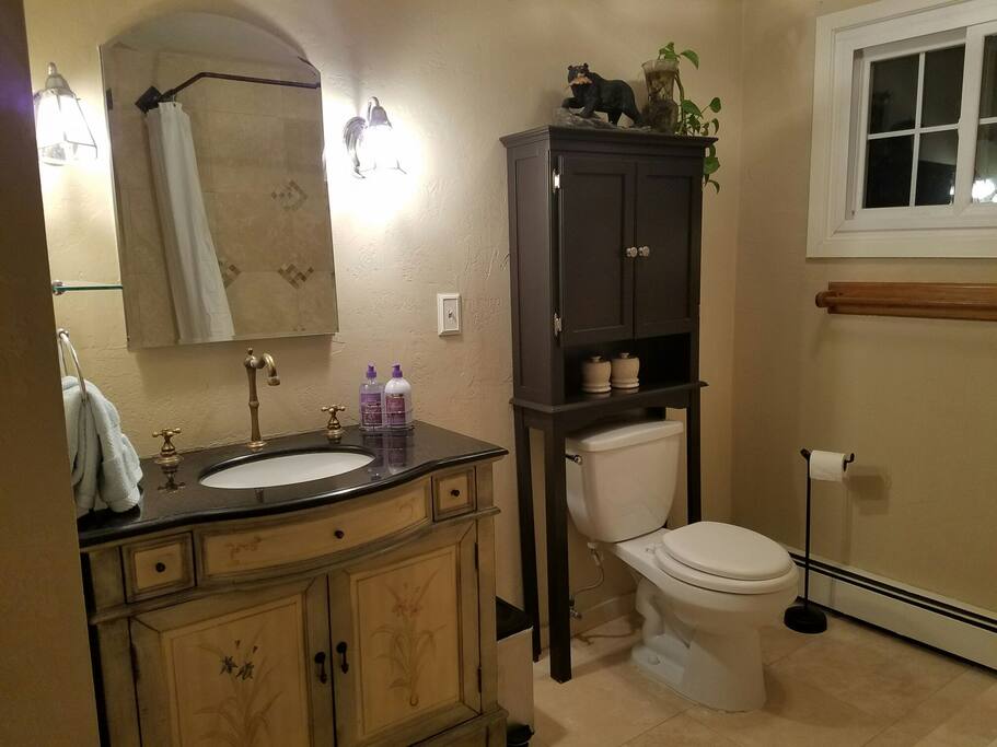 The bathroom is located